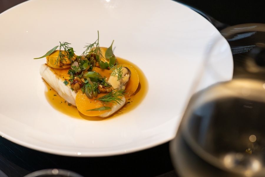 Blas Restaurant Dinner. Cod with Car y Mor Mussels