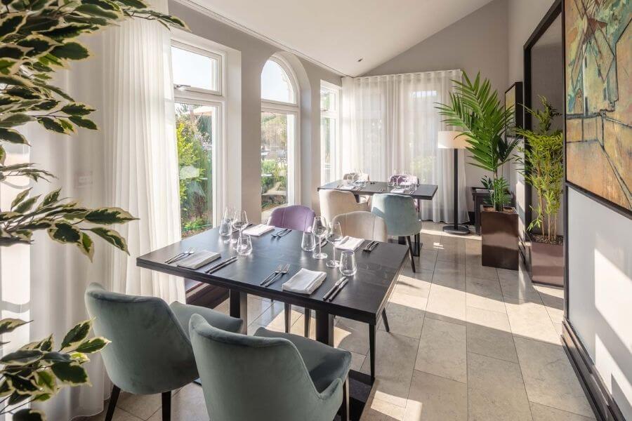 Blas Restaurant Conservatory with artwork by Harry Adams