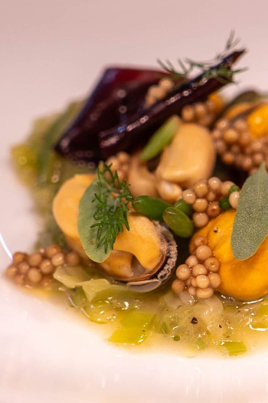 Fresh mussels being prepared by the Blas Restaurant kitchen team for a summer menu dish, celebrating the flavours of Pembrokeshire’s coastline.